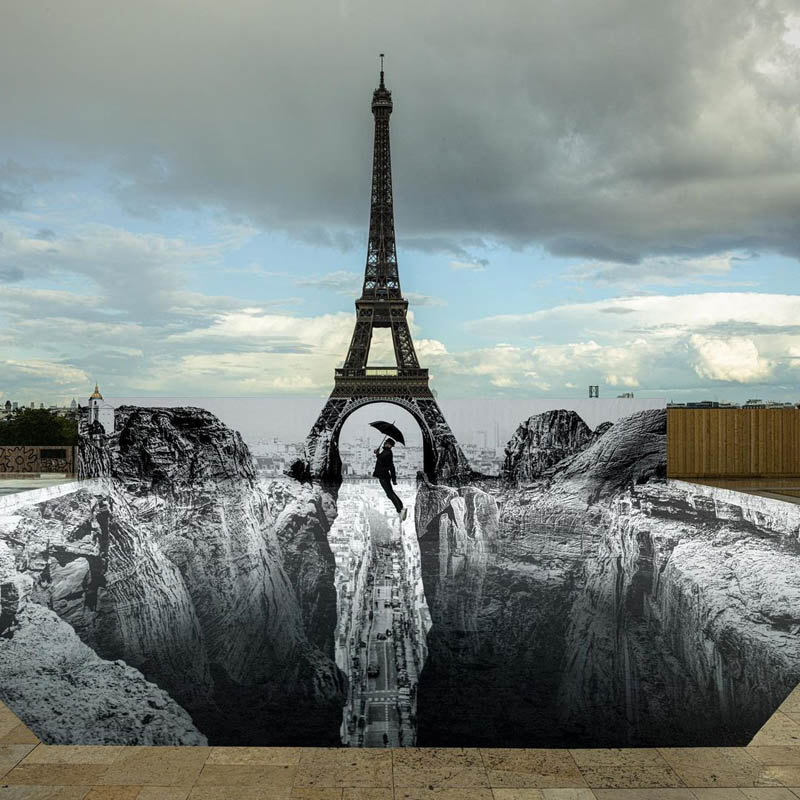 Artista francês JR instalou uma ilusão de desfiladeiro sob a Torre Eiffel